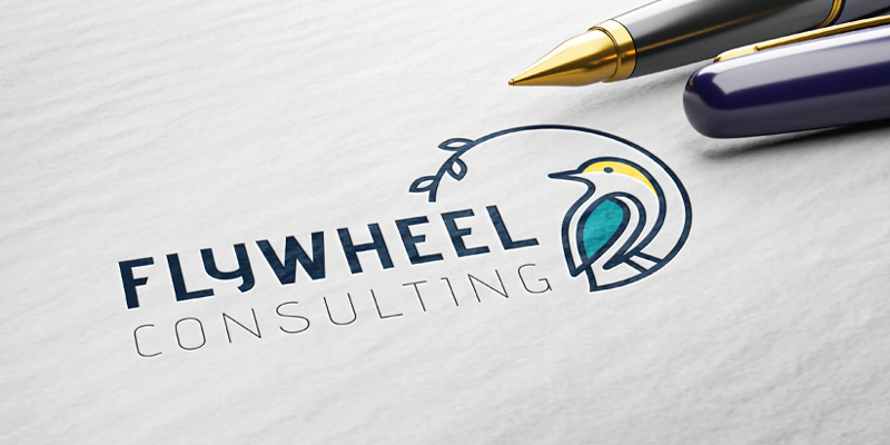 Logo on textured paper with a pen on the side. 